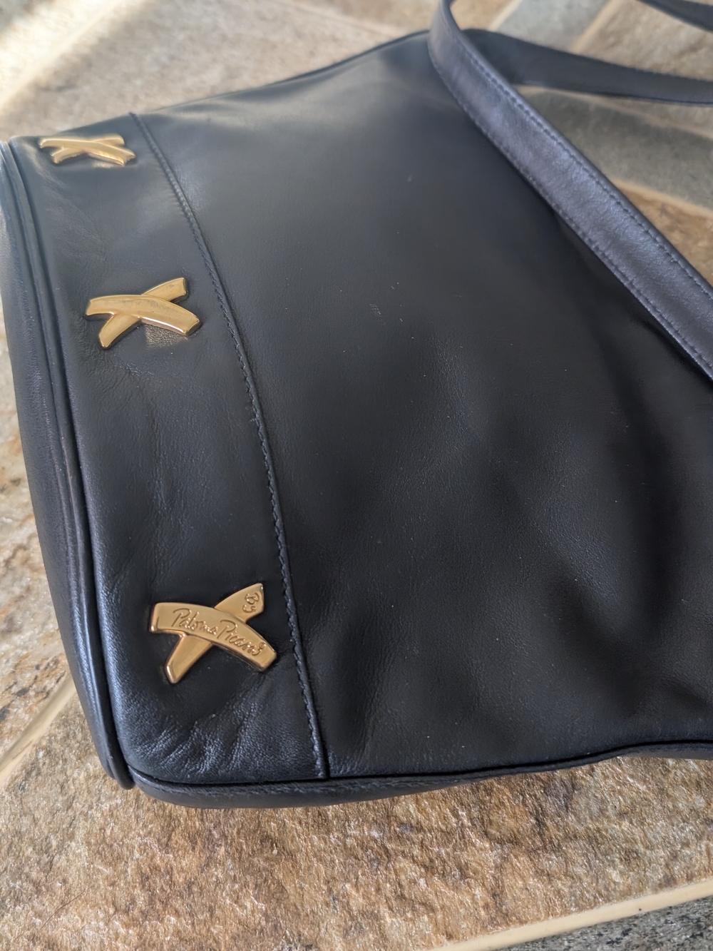 Paloma Picasso Authentic Black Leather Shoulder Bag with Gold Accents.